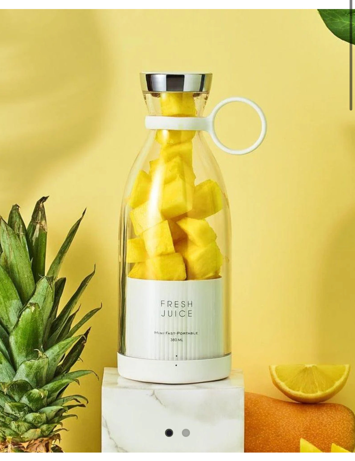 Viral Products Online fresh juice container with pineapples and lemons on vibrant yellow background.