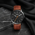 Fossil City Model K2G226G6 – Unisex brown leather analog watch with stylish design, durable build, and comfortable everyday wear.