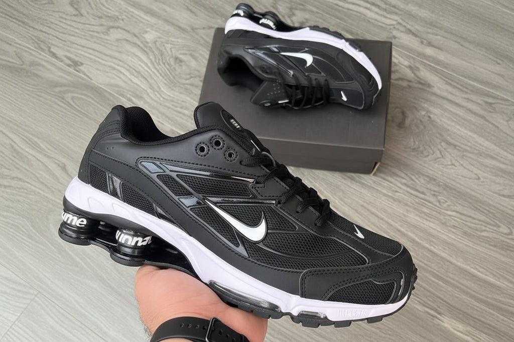 Nike Shox Supreme – Premium performance sneakers in black with top-quality materials, comfort, and stylish design.