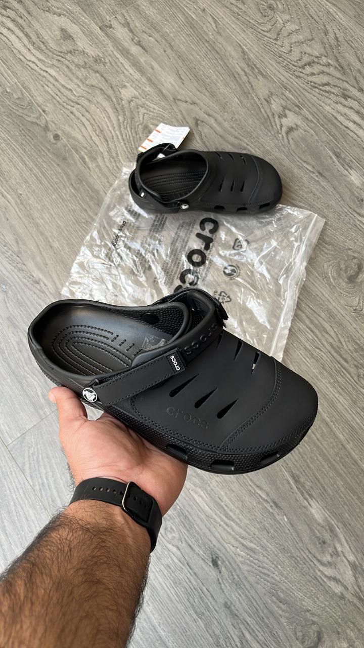 Crocs Yukon Sandals – Premium comfort footwear in brown-green with lightweight design, durability, and all-day wearability.