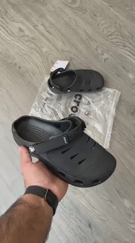 Crocs Yukon Sandals – Premium comfort footwear in brown-green with lightweight design, durability, and all-day wearability.